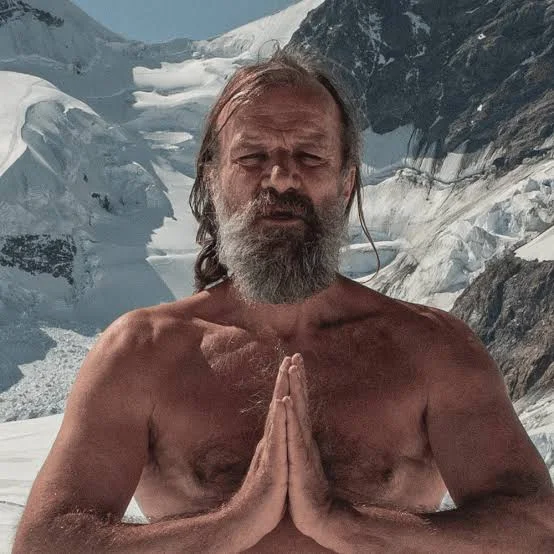Wim Hof, hands together in front of a glacier